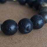 Himalayan Lava Stone & Pyrite Bead Bracelet with Tibetan Spacer