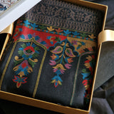 Decorative fabric with intricate patterns in a gold box
