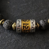 Tibetan Lava Stone & Prayer Wheel Beaded Bracelet – Adjustable Buddhist Knot