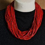 Handmade Naga coral bead necklace with 60 strands and traditional coin detail