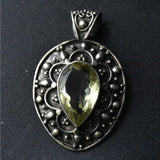 Handmade faceted citrine gemstone pendant in 925 sterling silver