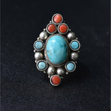 Ethnic turquoise and coral pendant in Tibetan silver, vintage-style jewelry with handcrafted details